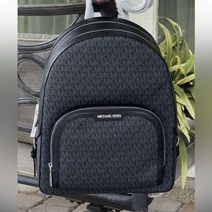 Michael Kors Women’s Black MK Logo Backpack with Matching Wallet.